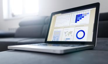 laptop computer with a circle chart