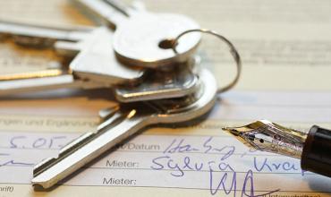 Eviction Moratoriums Extended Keys next to a pen
