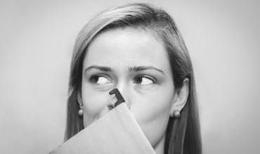 A woman holding a folder