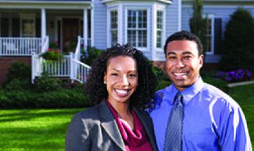 Home Equity 101 Couple in front of home
