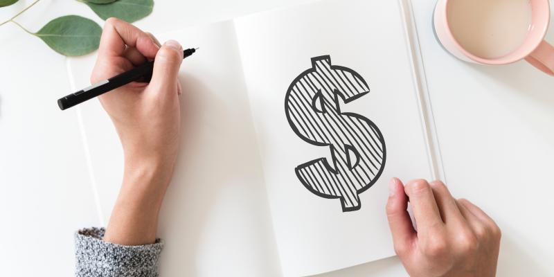 What to Expect at Closing a notebook with a dollar sign drawn in marker