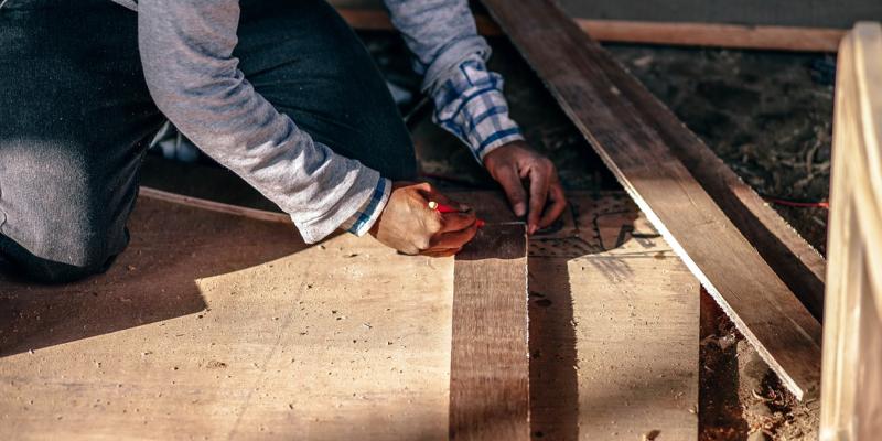 a man working on a house