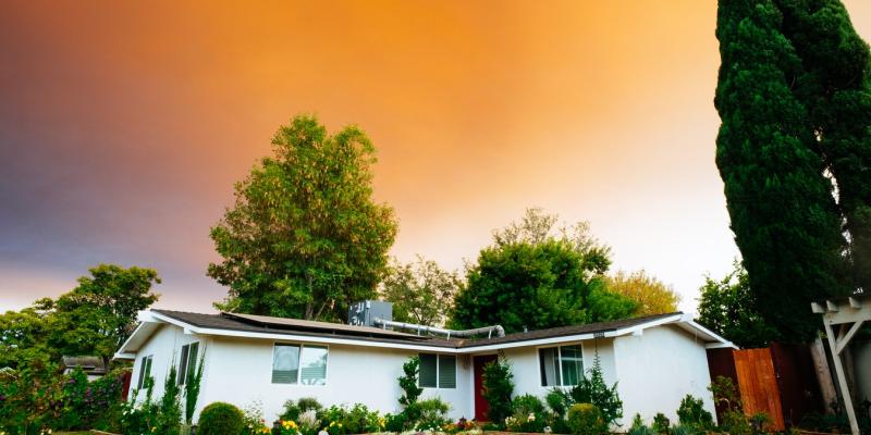 a house in a sunset