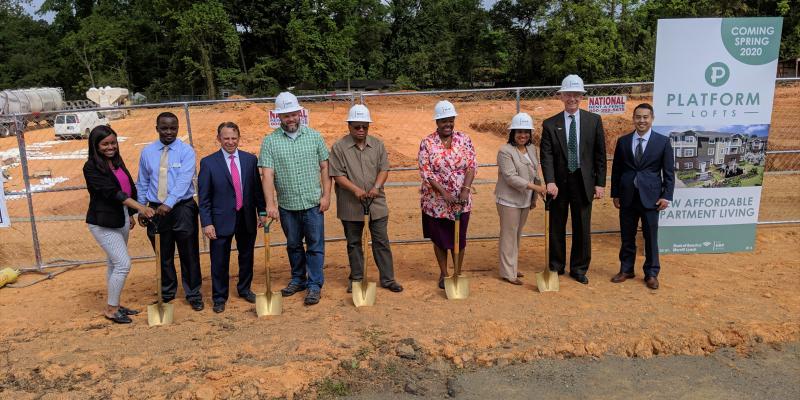 Photo of people preparing to break ground 