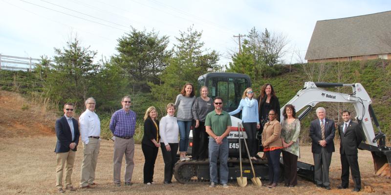 People breaking ground on the project